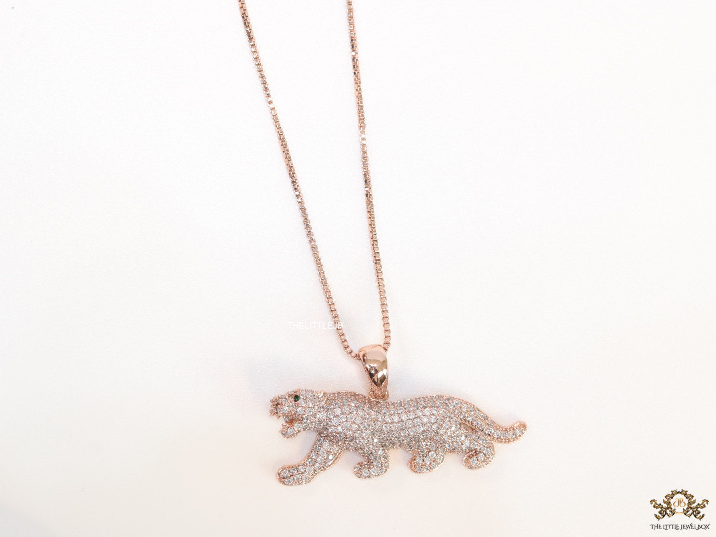 Rose Gold plated cubic zirconia panther pendant on sleek platinum plated chain