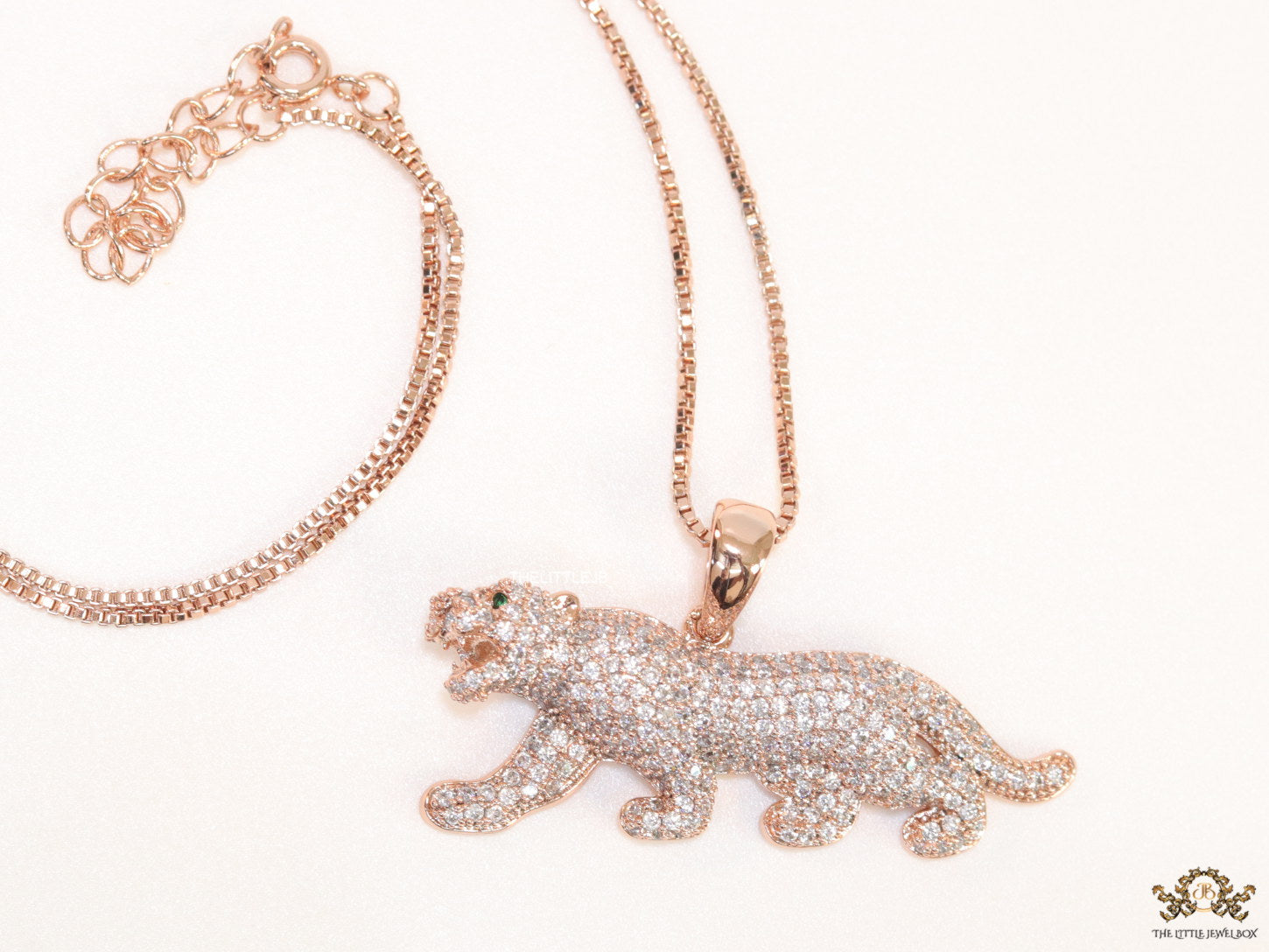 Rose Gold plated cubic zirconia panther pendant on sleek platinum plated chain
