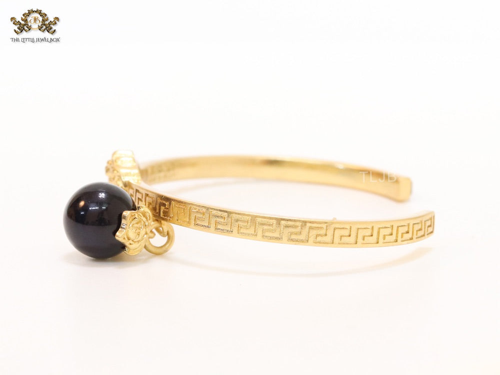 Half and Half Medusa gold Bracelet with hanging ball