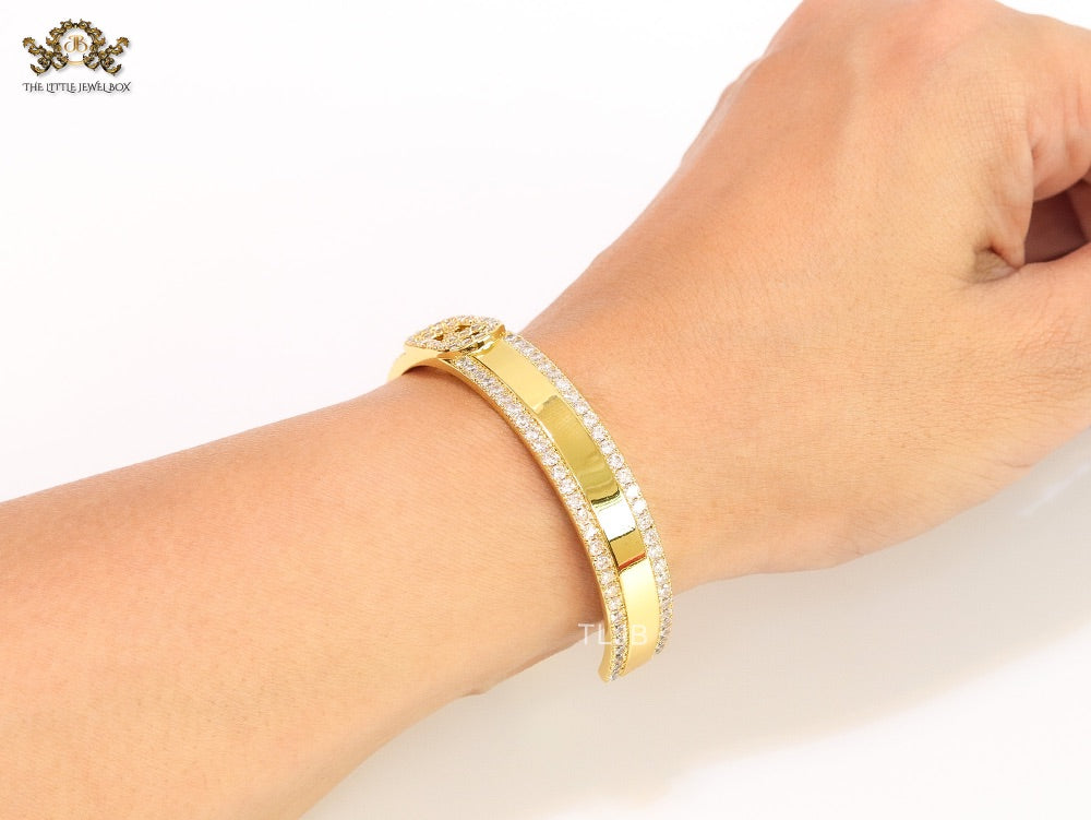 Double F on gold bracelet with cz