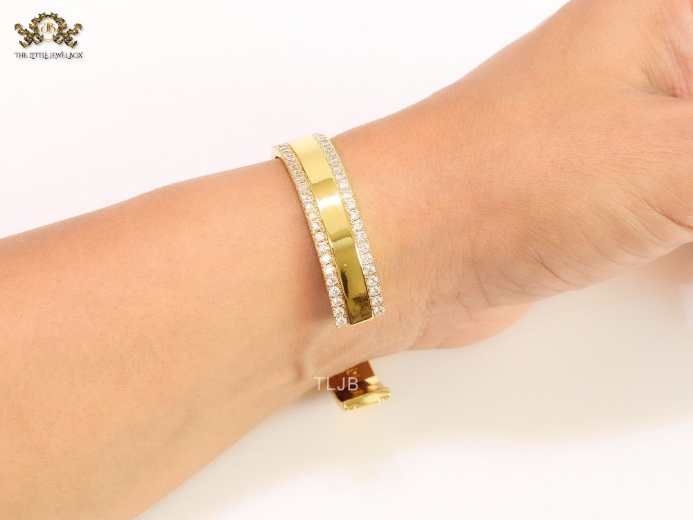 Double F on gold bracelet with cz