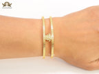 Medusa on gold bracelet