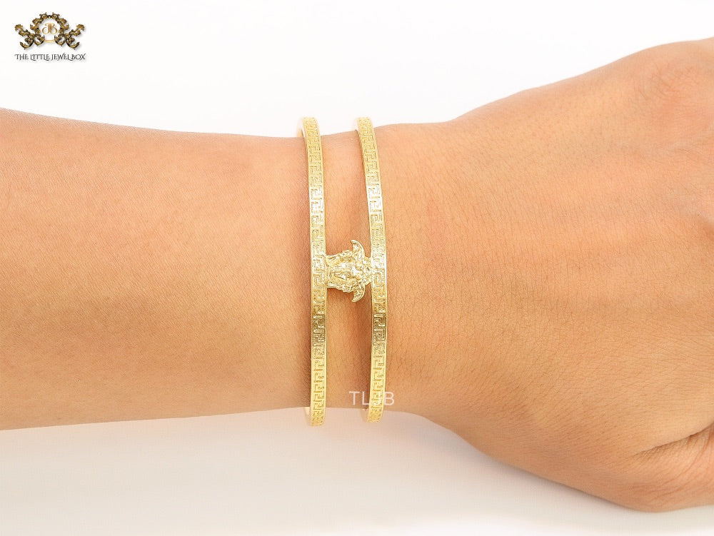 Medusa on gold bracelet