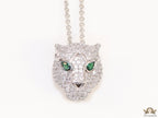 Platinum plated cubic zirconia stones panther face motif pendant with emerald green stones details on sleek Platinum plated chain