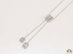 Emerald cut cubic zirconia stones in different sized on sleek platinum plated chain