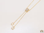 Emerald cut cubic zirconia stones in different sized on sleek gold plated chain