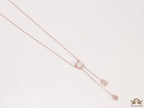 Emerald cut cubic zirconia stones in different sized on sleek rose gold plated chain