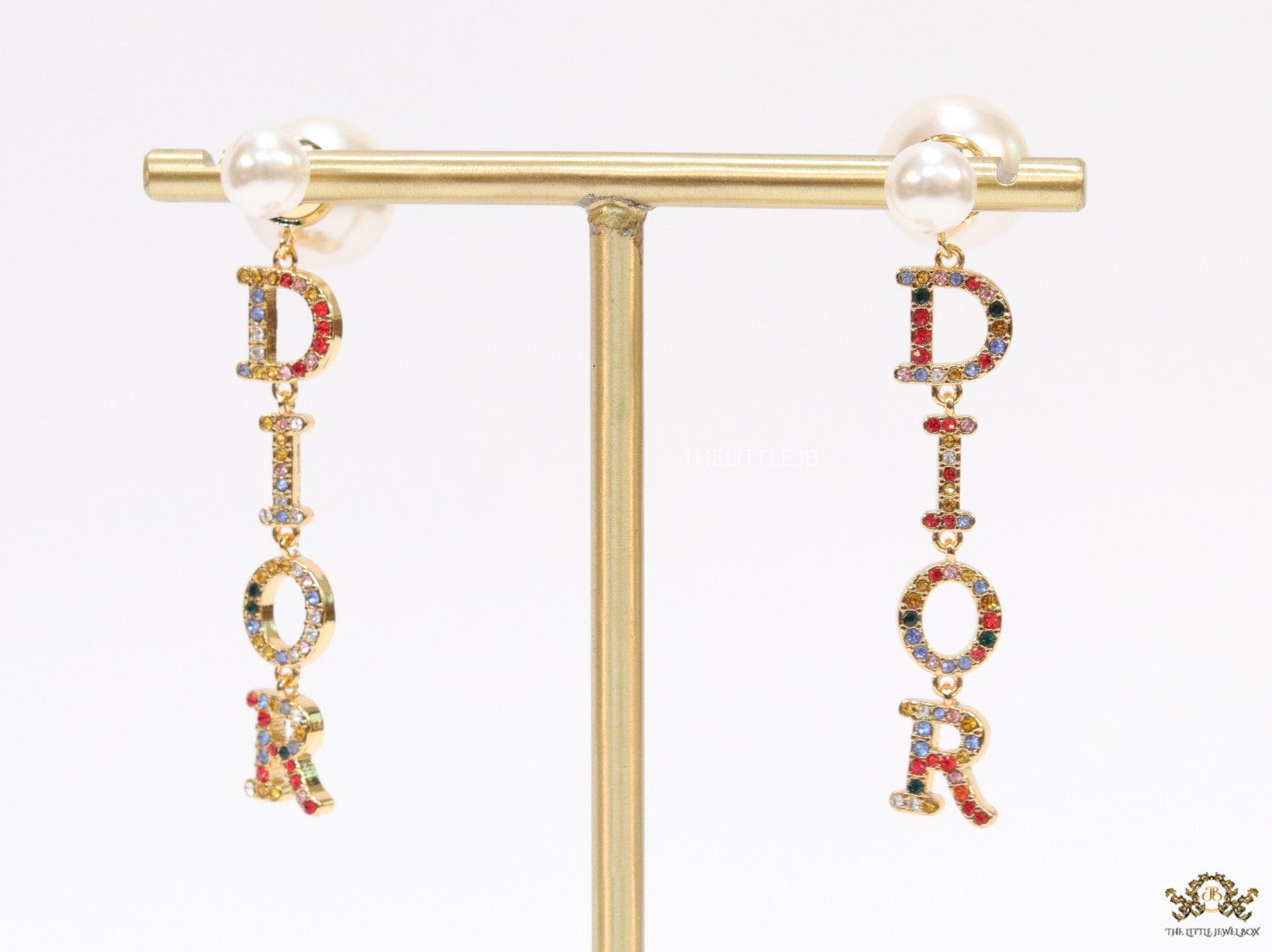 Multi cz alphabet dangles with pearl tops
