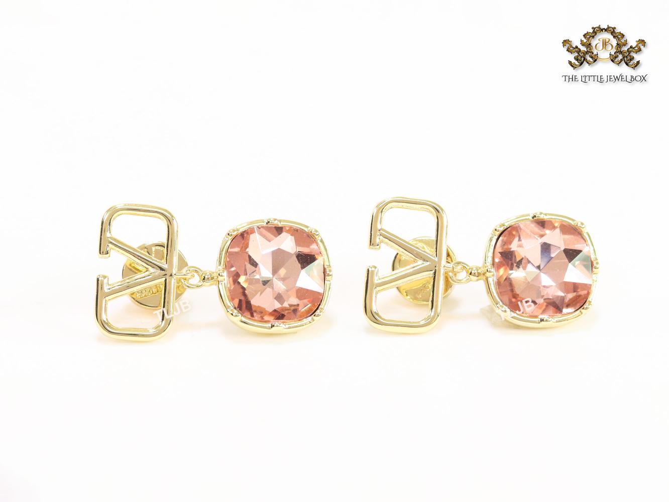 Alphabet open V dangles with pink stone