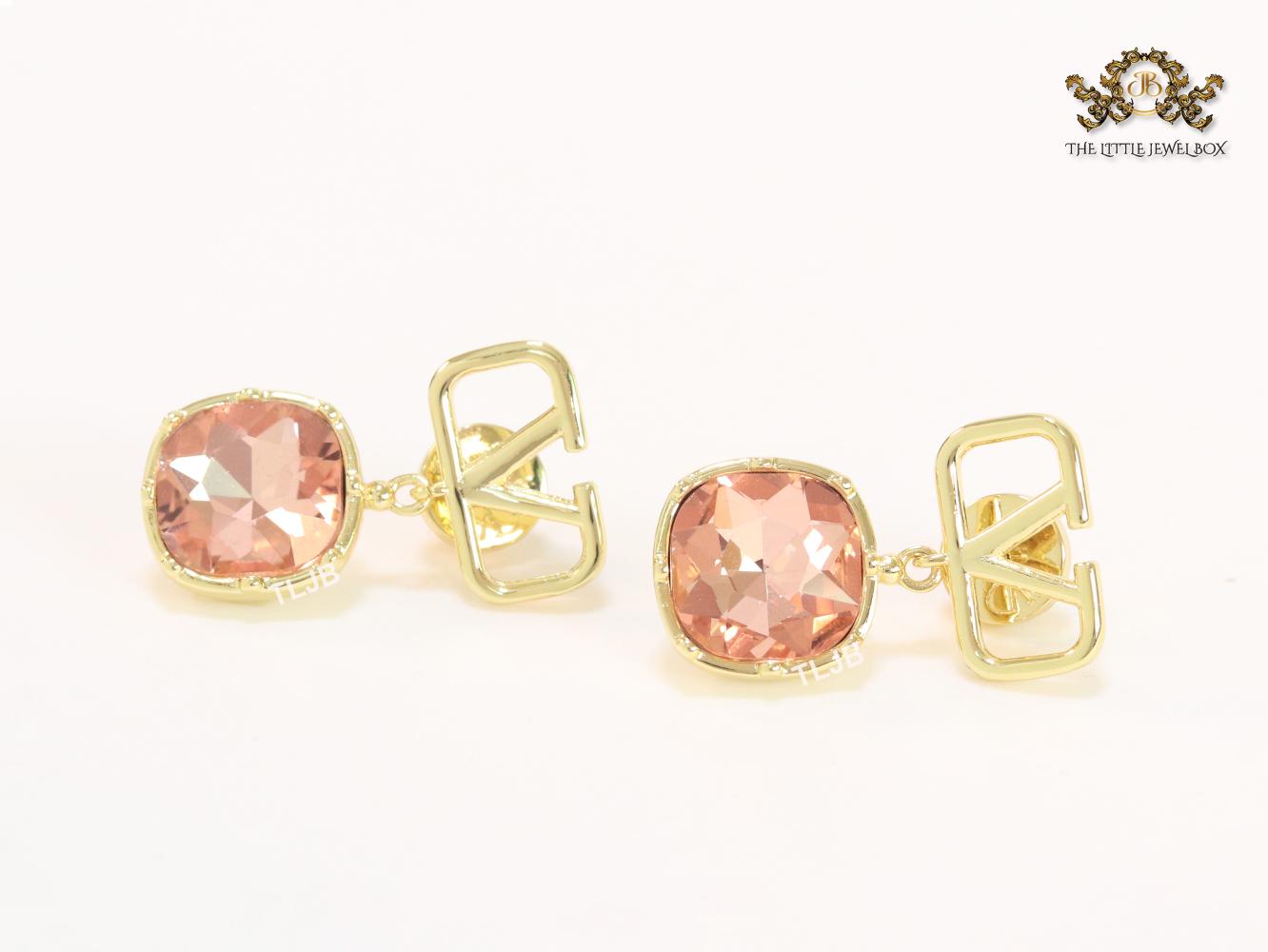 Alphabet open V dangles with pink stone