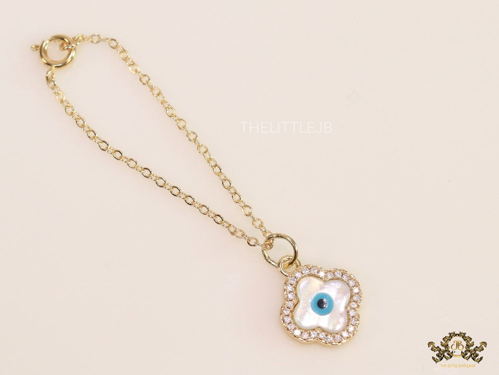 Gold plated cz evil eye clover watch charm with mother of pearl element