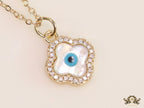 Gold plated cz evil eye clover watch charm with mother of pearl element