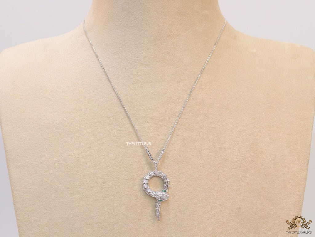 Sleek Platinum plated chain with Platinum plated cubic zirconia ancient serpentine symbol pendant
