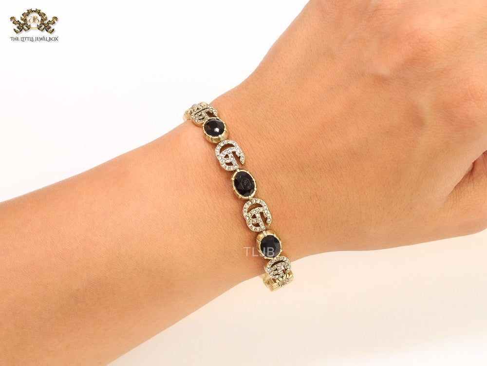 Double G cz with black stone open gold bracelet