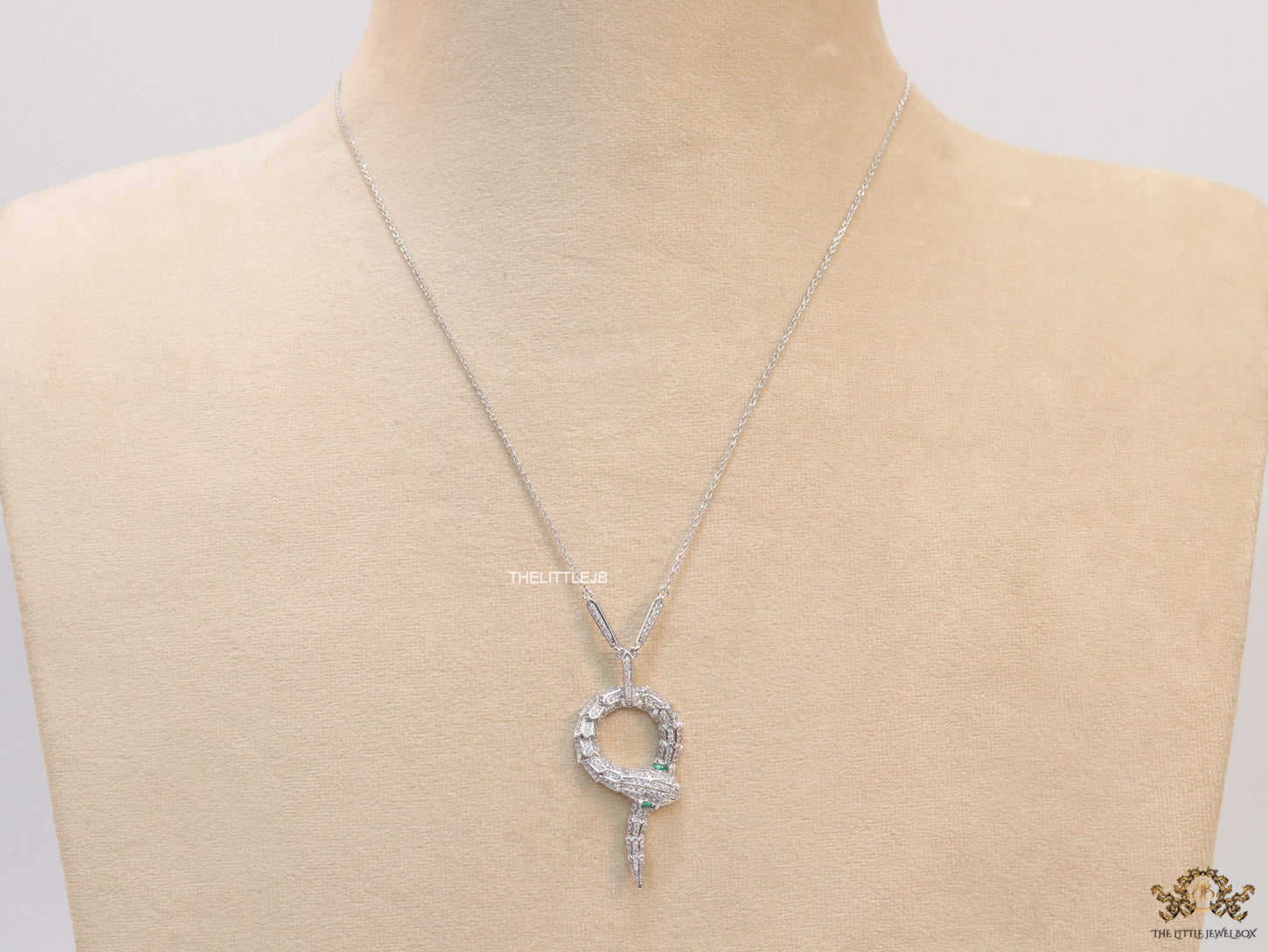 Sleek Platinum plated chain with Platinum plated cubic zirconia ancient snake symbol pendant