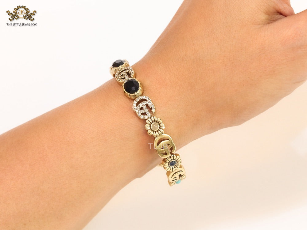 Double G cz with black stone open gold bracelet