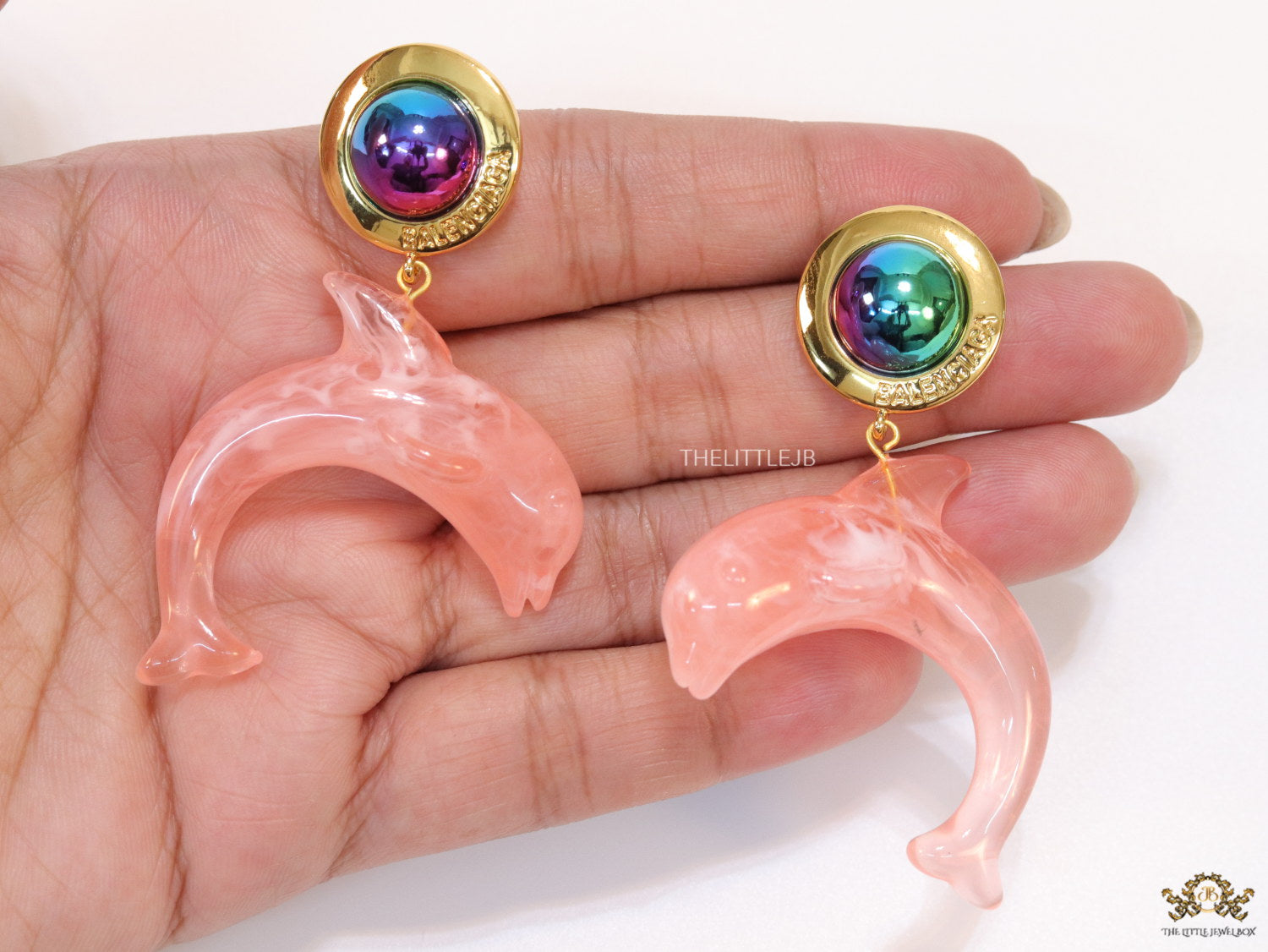 Pink dolphin earring with metallic shade stone