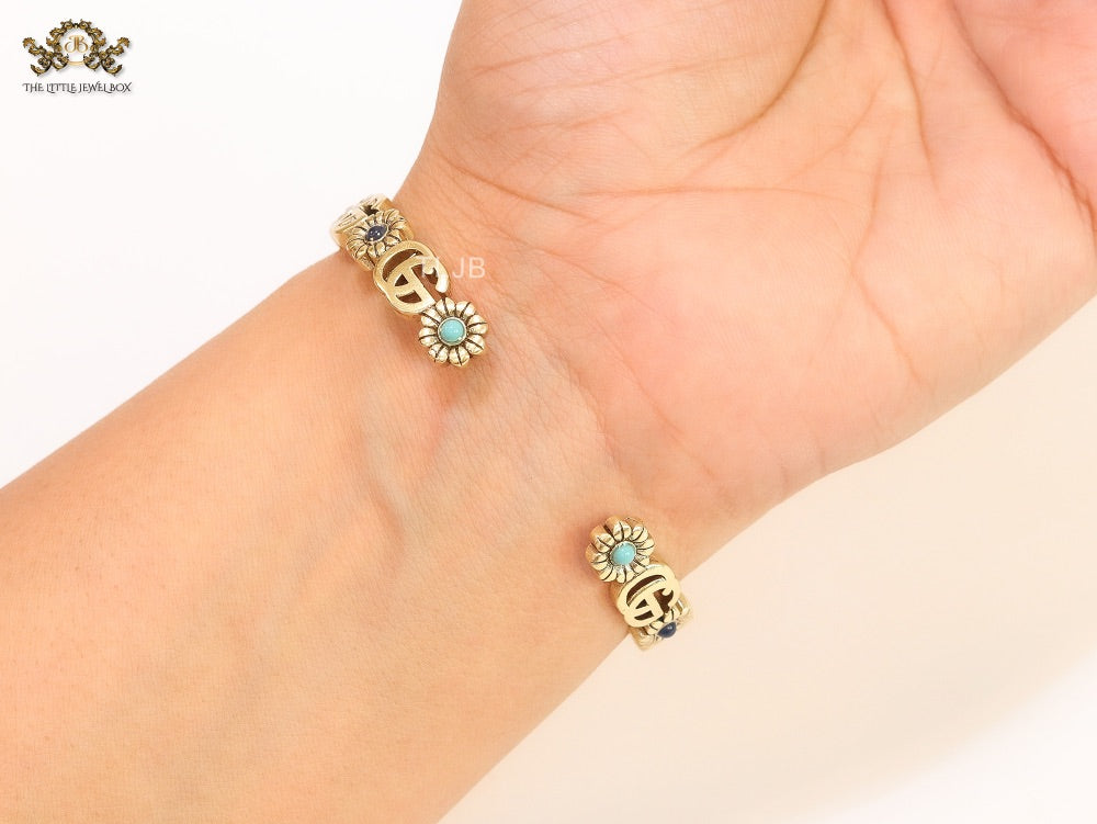 Double G cz with black stone open gold bracelet