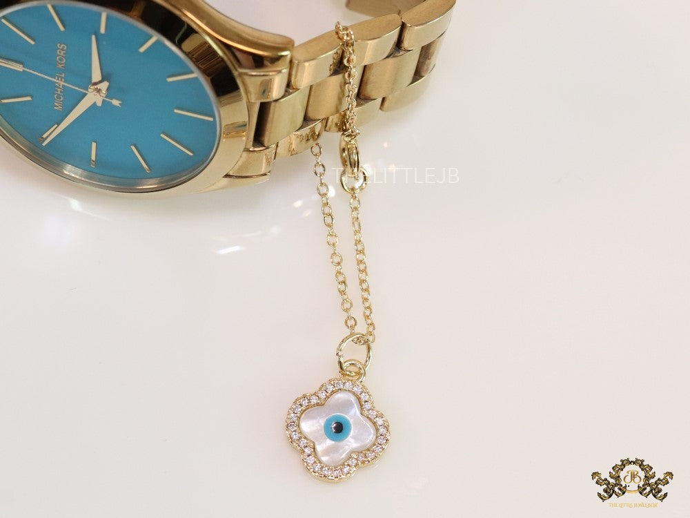 Gold plated cz evil eye clover watch charm with mother of pearl element