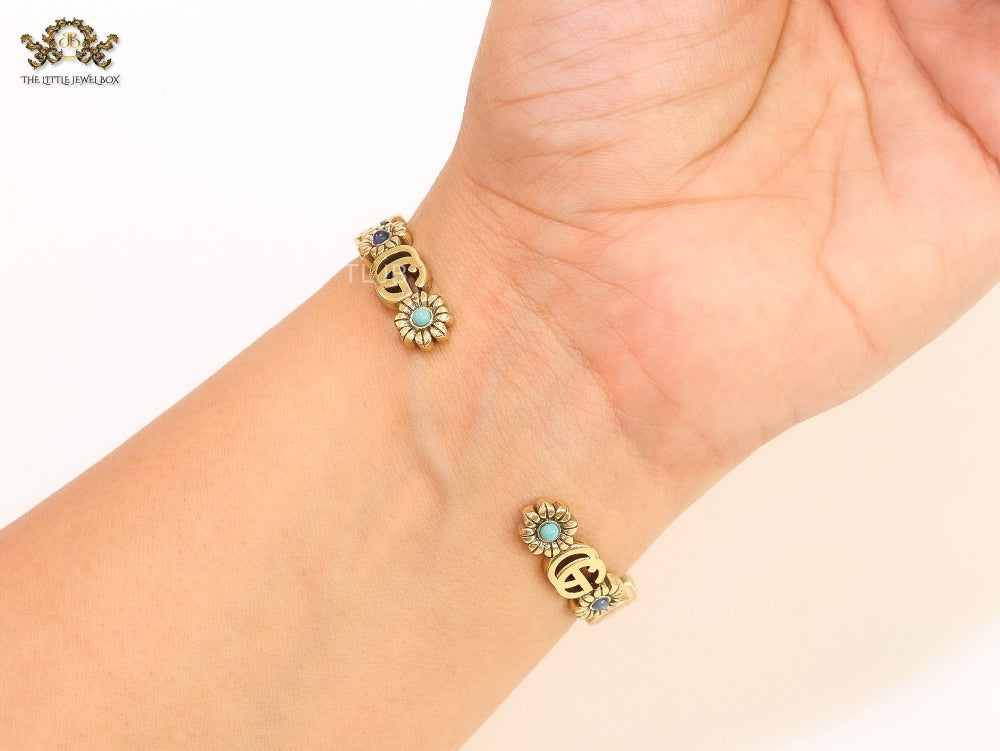 Double G cz with stone open gold bracelet