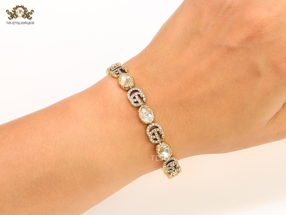 Double G cz with stone open gold bracelet