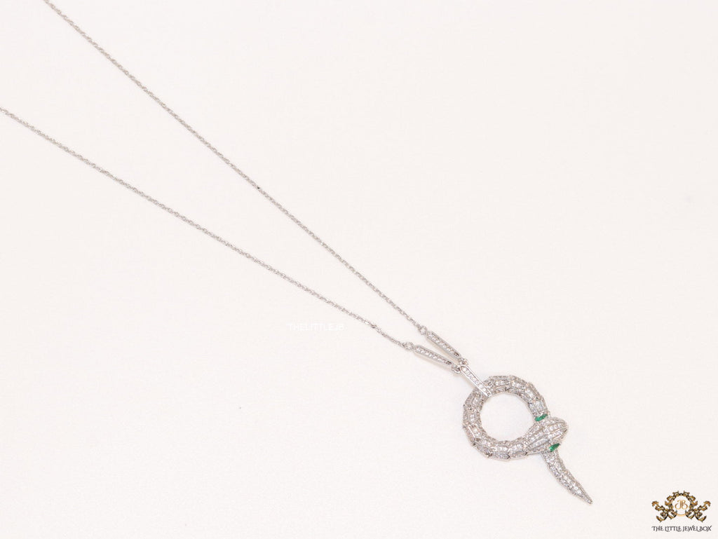 Sleek Platinum plated chain with Platinum plated cubic zirconia ancient snake symbol pendant