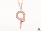 Sleek rose gold plated chain with gold plated cubic zirconia ancient snake symbol pendant