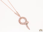 Sleek rose gold plated chain with gold plated cubic zirconia ancient serpentine symbol pendant