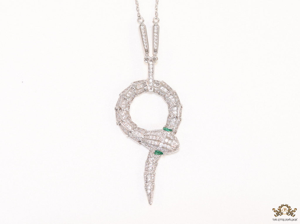 Sleek Platinum plated chain with Platinum plated cubic zirconia ancient serpentine symbol pendant