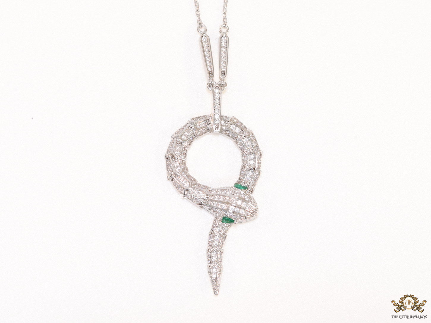 Sleek Platinum plated chain with Platinum plated cubic zirconia ancient serpentine symbol pendant