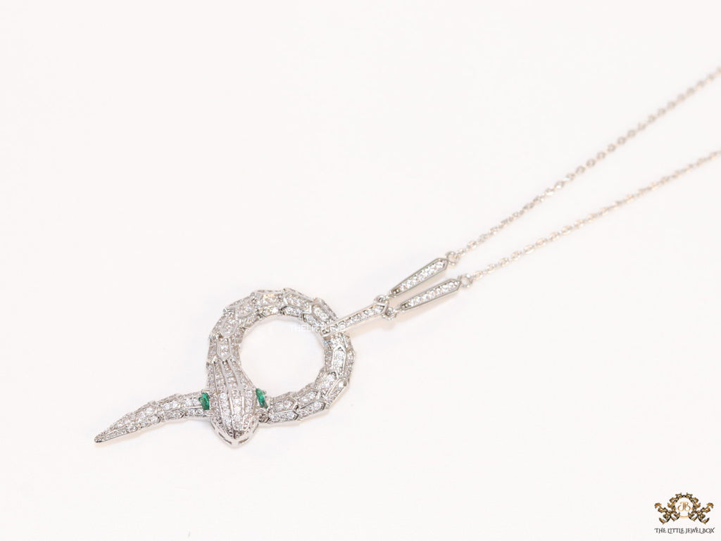 Sleek Platinum plated chain with Platinum plated cubic zirconia ancient serpentine symbol pendant