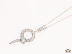 Sleek Platinum plated chain with Platinum plated cubic zirconia ancient serpentine symbol pendant