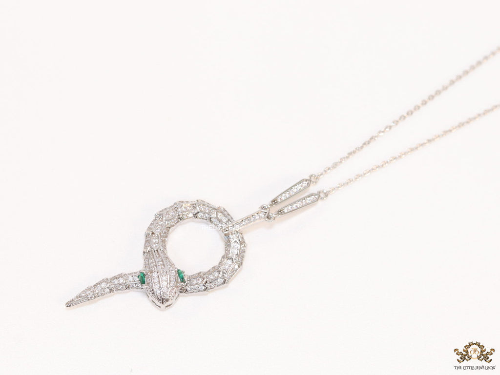 Sleek Platinum plated chain with Platinum plated cubic zirconia ancient snake symbol pendant