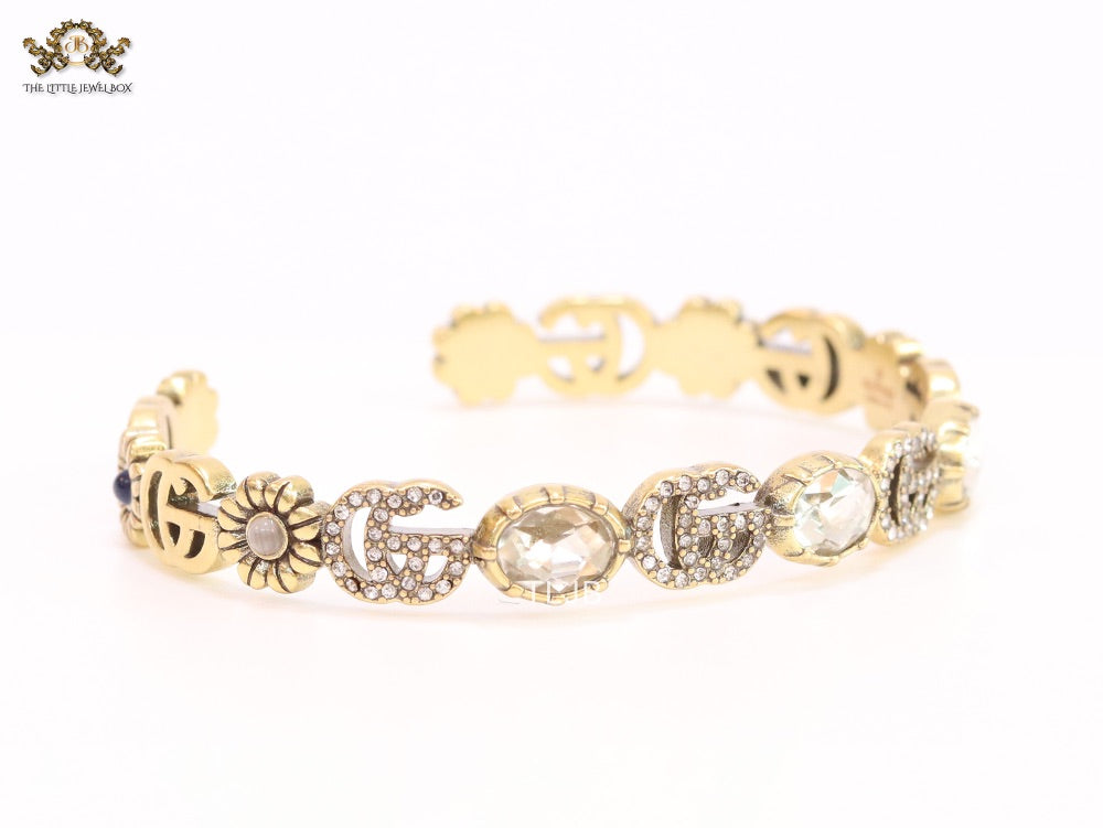 Double G cz with stone open gold bracelet