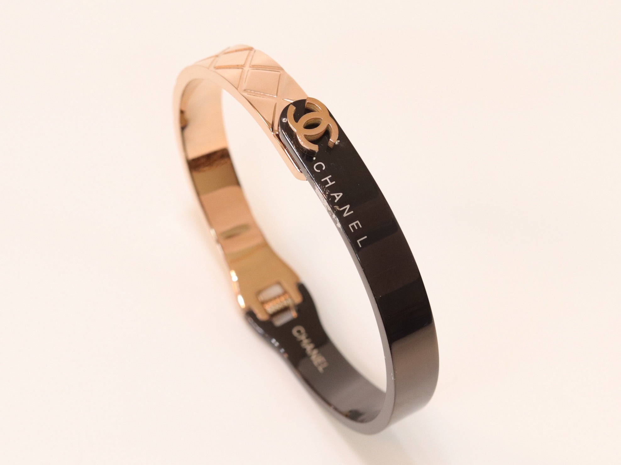 Half n Half rose gold black cross band style bracelet