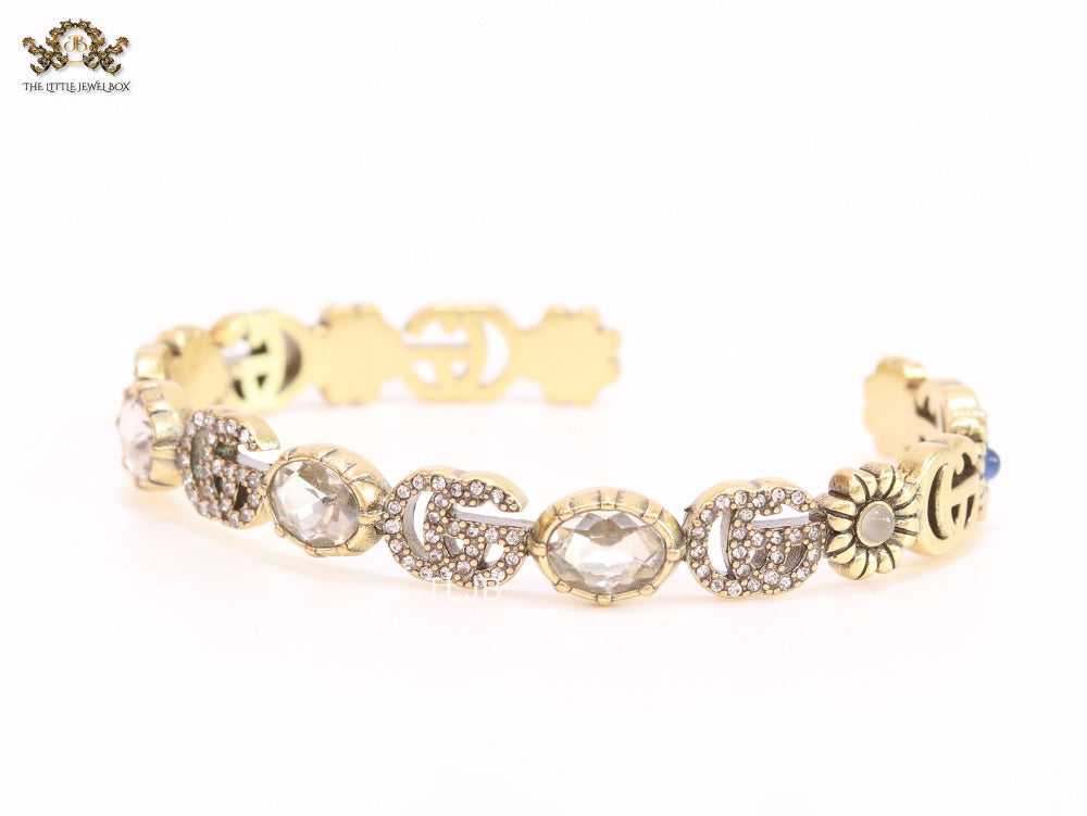 Double G cz with stone open gold bracelet