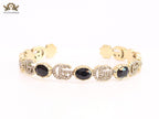 Double G cz with black stone open gold bracelet
