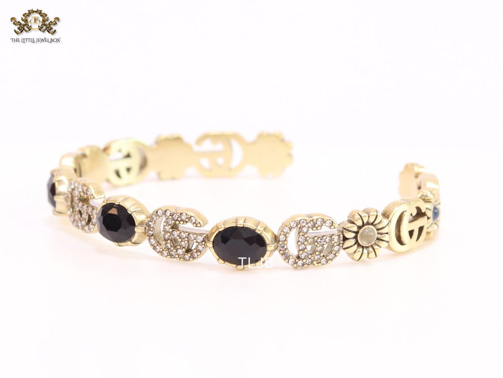 Double G cz with black stone open gold bracelet