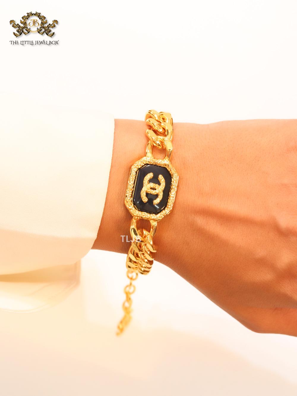 Double C black enamel and  gold link bracelet