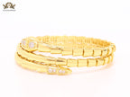Gold triple layered snake bracelet with cz