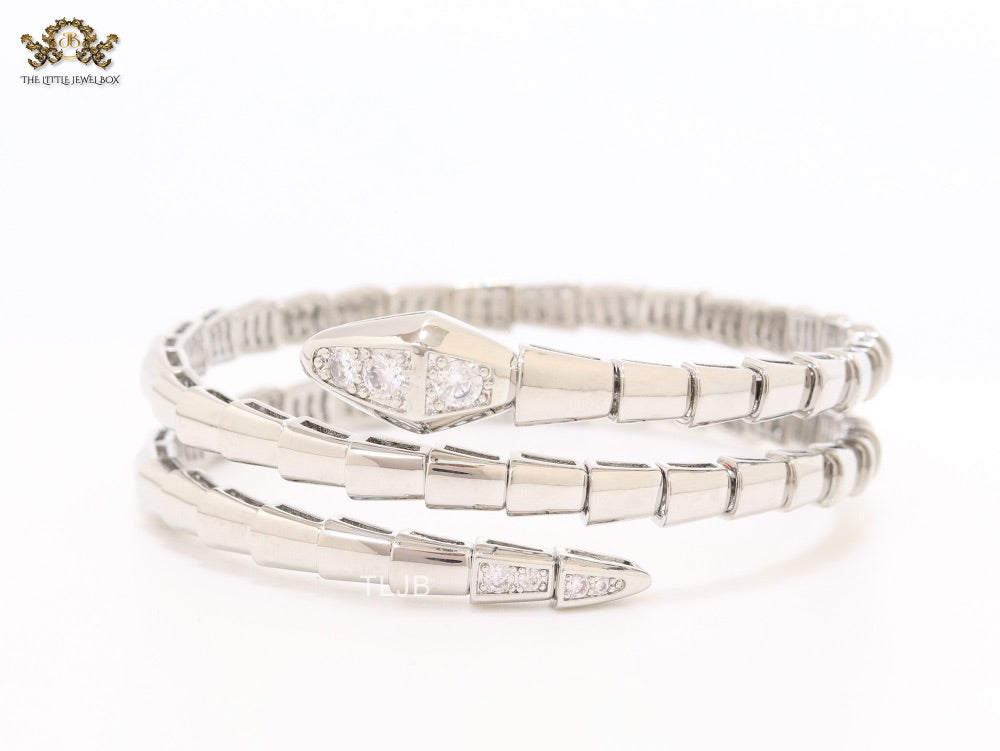 Platinum triple layered snake bracelet with cz