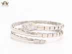 Platinum triple layered serpentine bracelet with cz