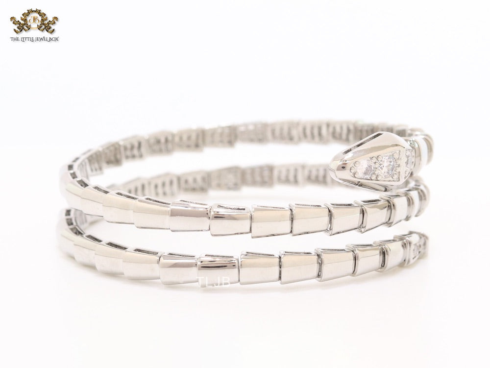 Platinum triple layered snake bracelet with cz