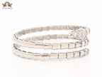 Platinum triple layered serpentine bracelet with cz