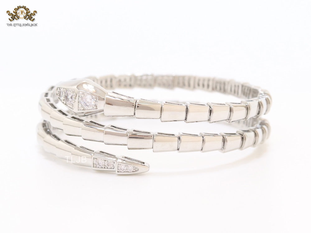 Platinum triple layered snake bracelet with cz