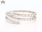Platinum triple layered snake bracelet with cz