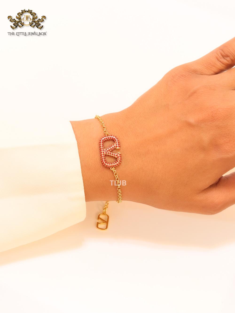 Open V red stones bracelet