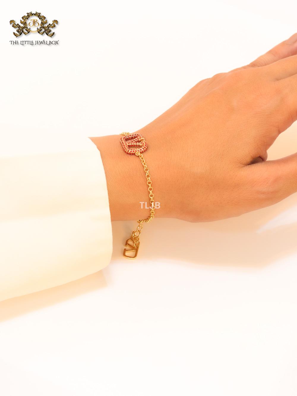 Open V red stones bracelet