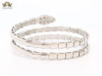 Platinum triple layered serpentine bracelet with cz