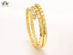 Gold triple layered snake bracelet with cz